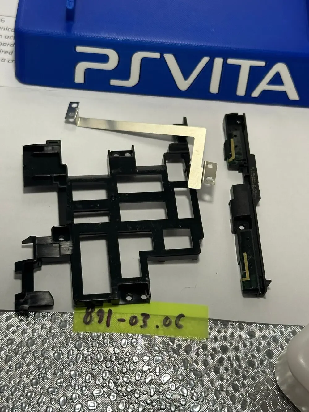 OEM ps vita 2000  Internal Midframe Chassis w / Speaker Housings- pre owned